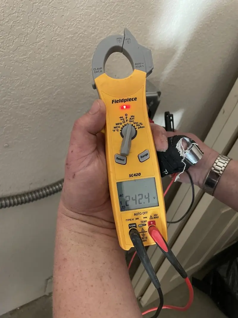 Voltage testing with clamp meter during Electrical Installation Services in Ojai